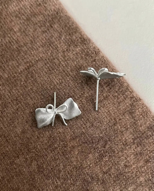 不對稱蝴蝶結鋯石耳環